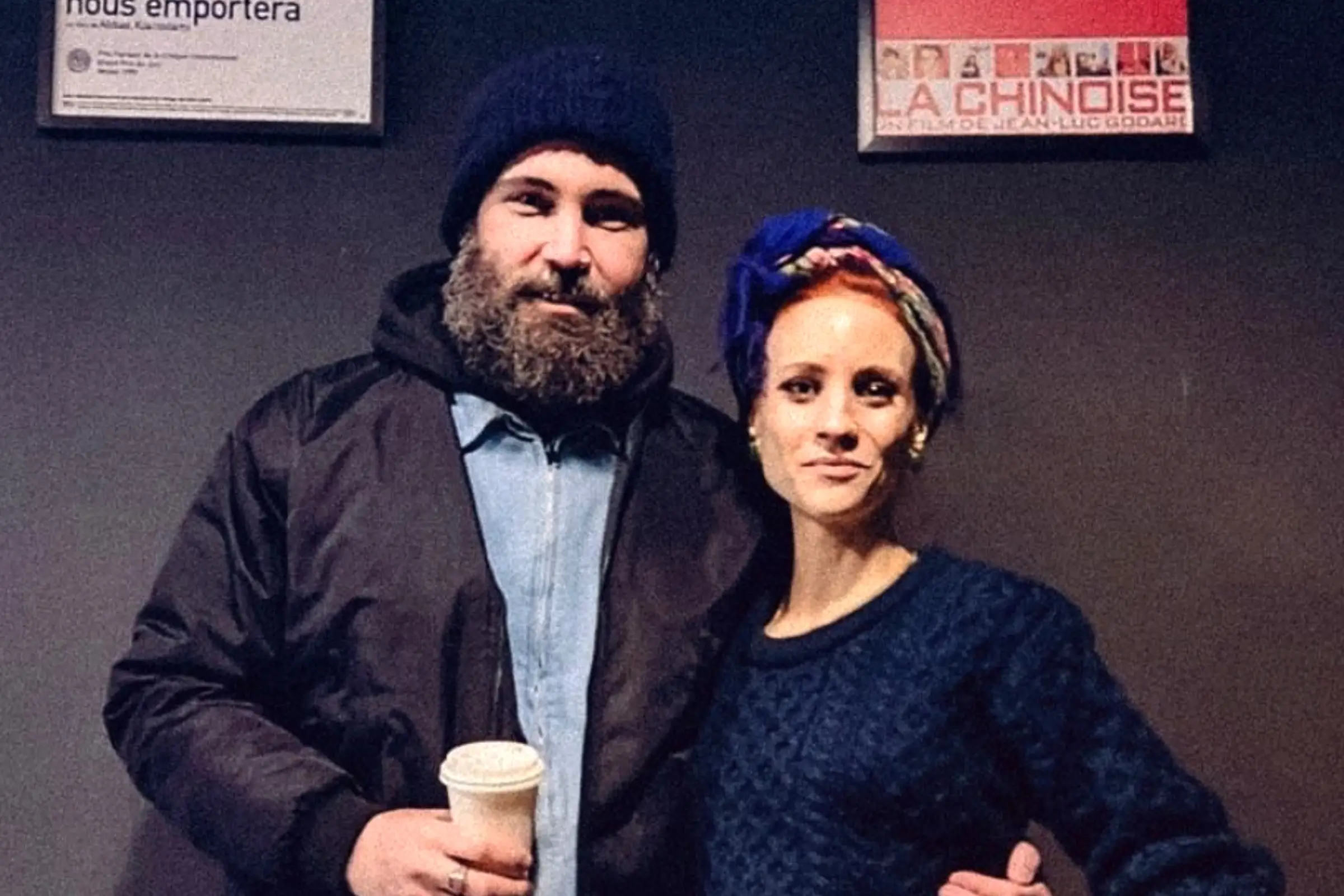 Danica and David, the founders of FOMO, in front of the cinema's film posters